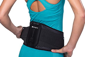 A woman wearing a Compex wearable around her waist
